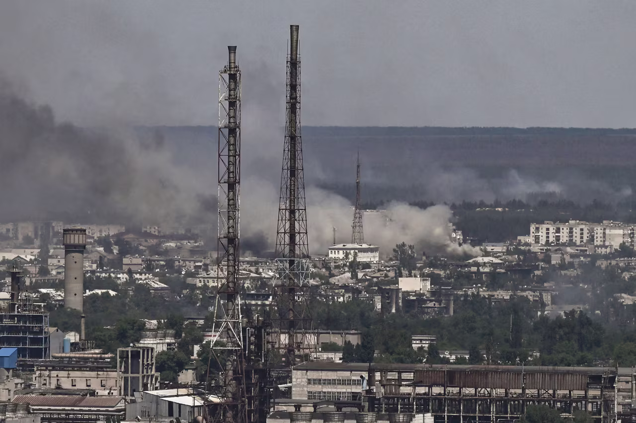 Black smoke and dirt rise above city of Severodonetsk during the battle between Russian and Ukrainian troops in the eastern Ukraine region of Donbas on June 9.