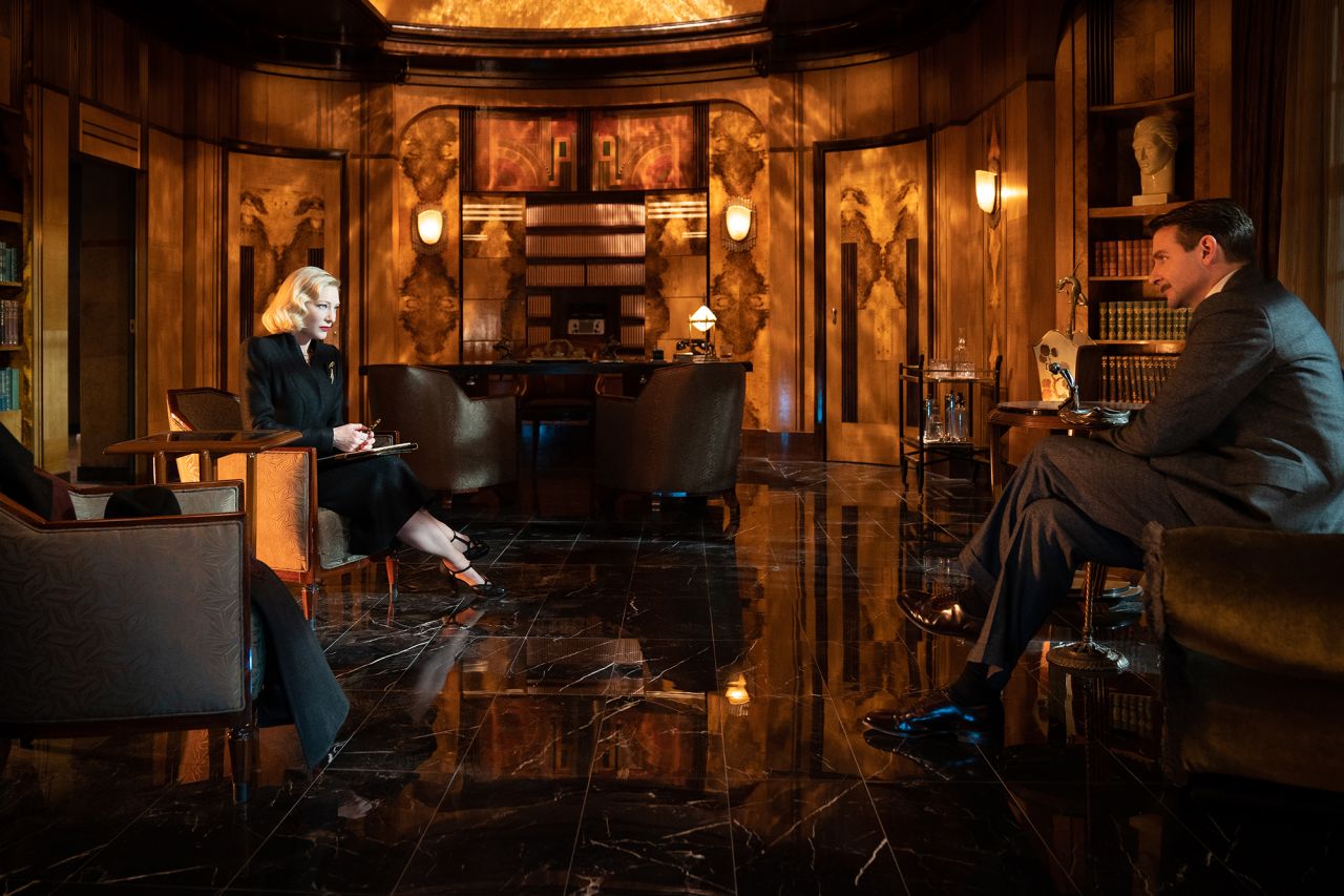 Cate Blanchett and Bradley Cooper in the film “Nightmare Alley”.