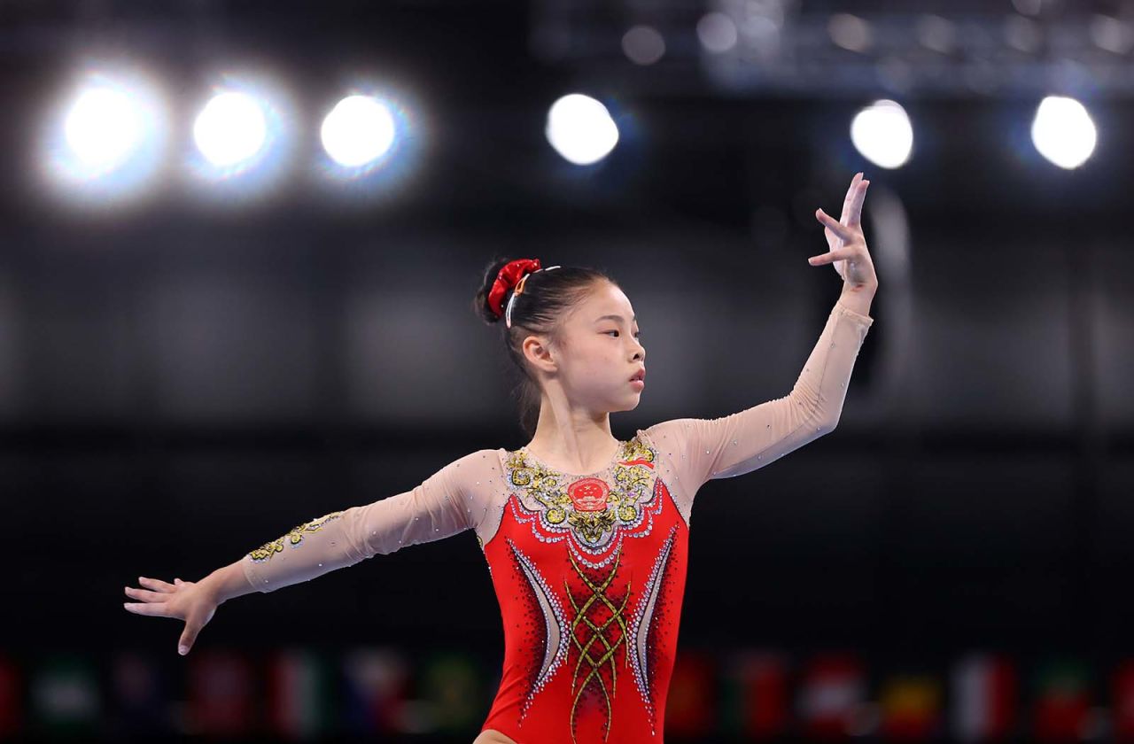 Guan Chenchen of China in action on the balance beam. REUTERS/Lindsey Wasson