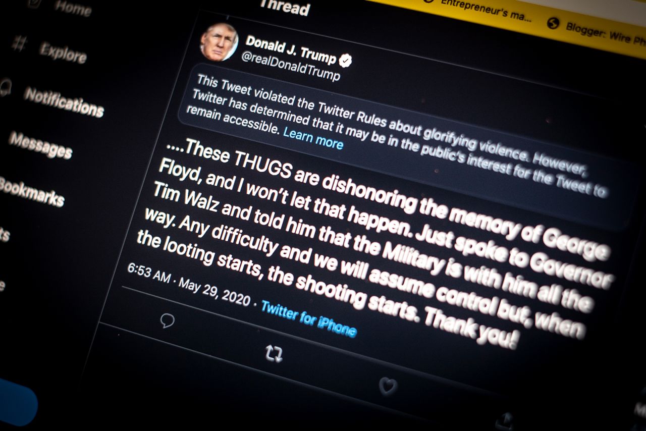 A tweet by President Donald Trump is seen being flagged on an Apple iPhone, on May 29.