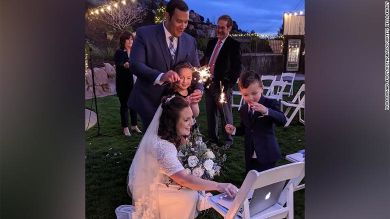 Marisa and Luis Bello set up a laptop to livestream their wedding, held on April 3 in Utah.
