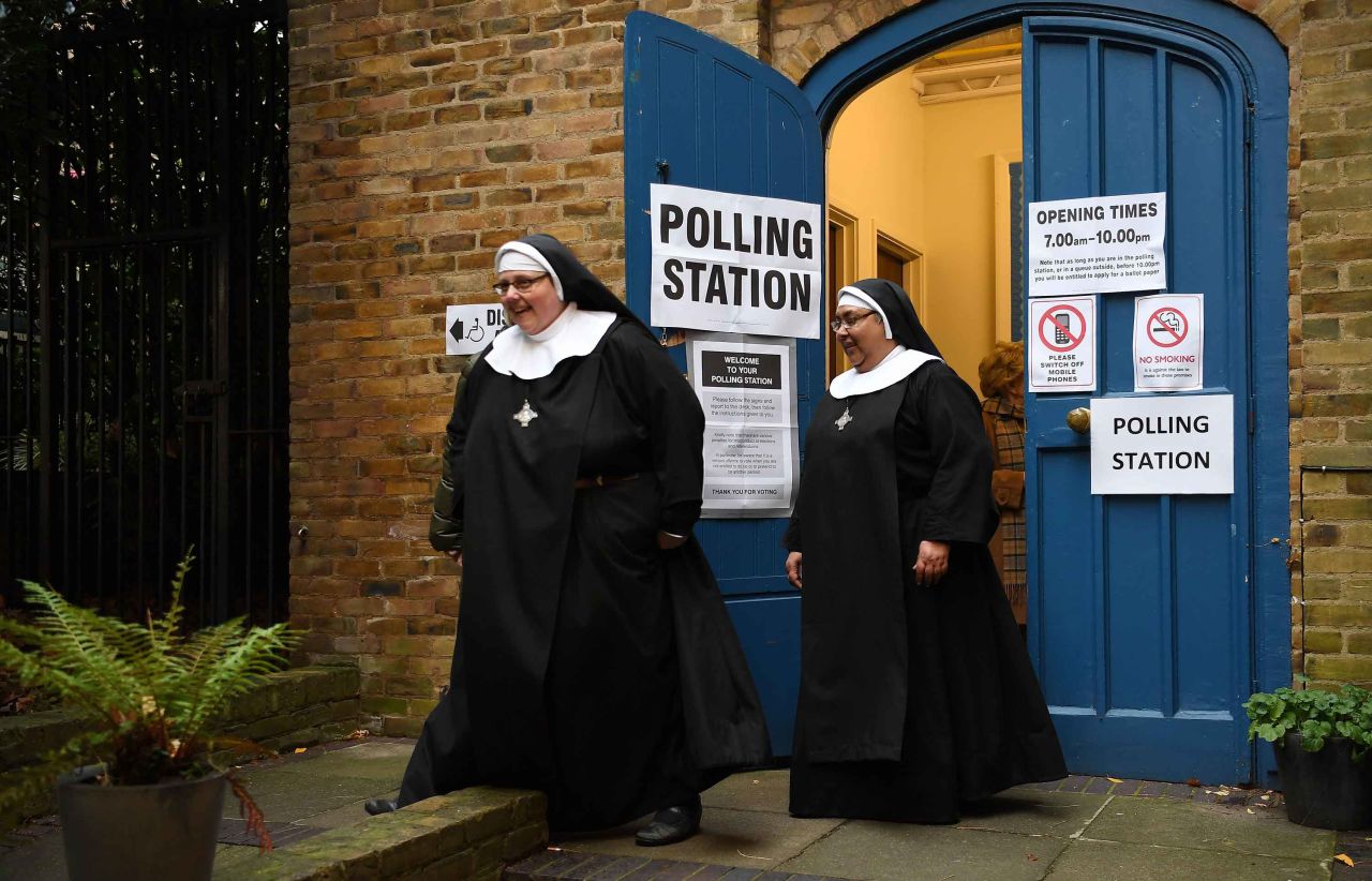 Nuns from the Tyburn Convent depart St. Johns church in London after voting in London. Photo: Andy Rain/EPA-EFE/Shutterstock