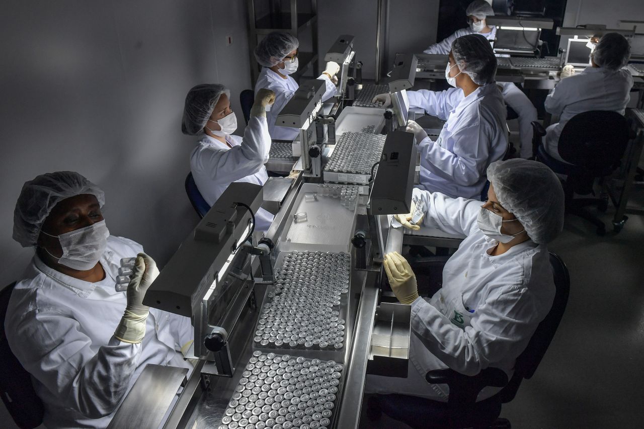 Staff prepare CoronaVac vaccines at the Butantan biomedical production center, in São Paulo, Brazil, on January 14.