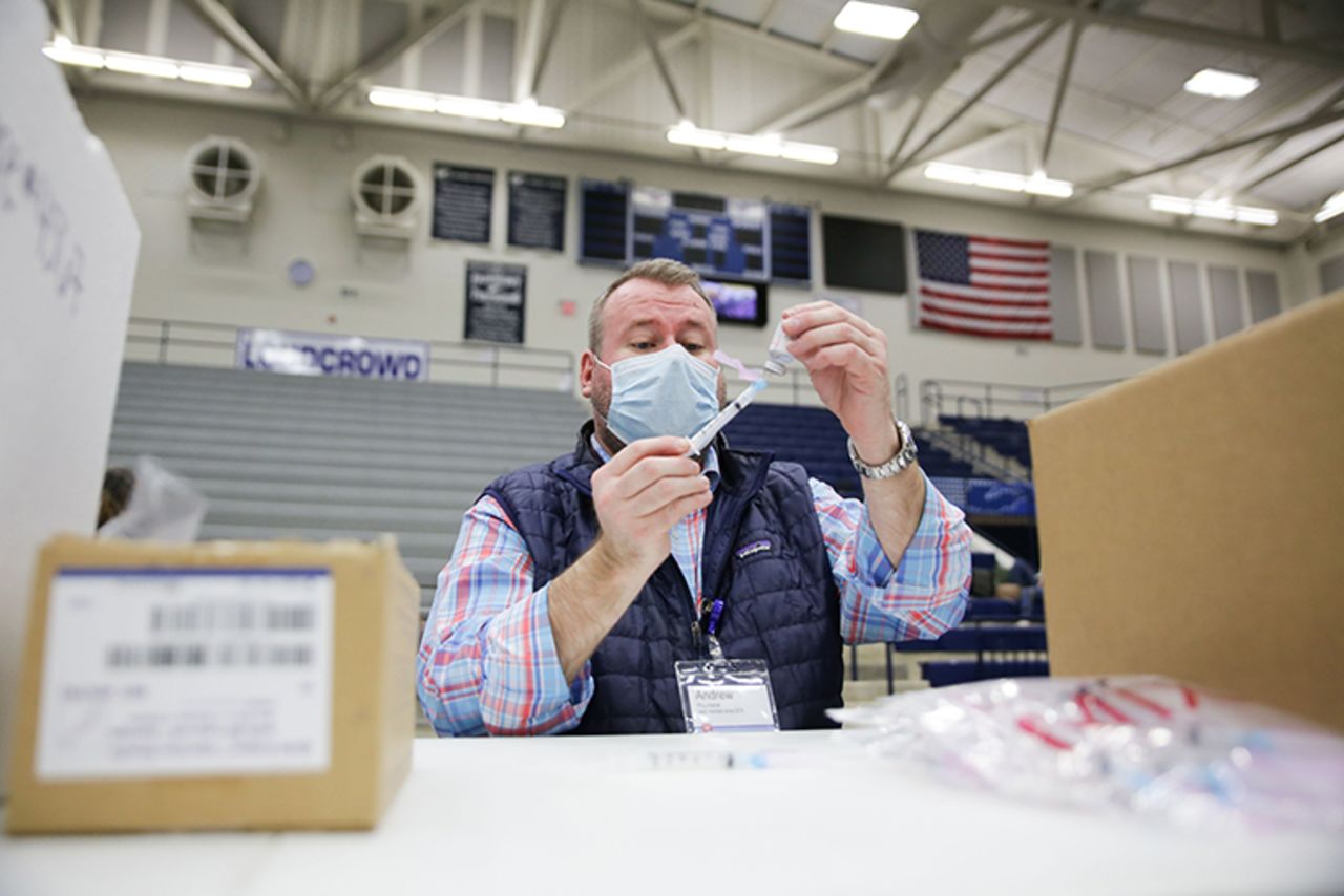 Walgreens staff prepare vaccines for Educational Staff at Kettering City Schools to receive the Covid-19 vaccine as a part of Ohios Phase 1B vaccine distribution in Dayton, Ohio on February 10. (