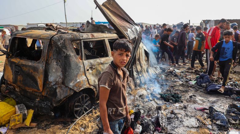 Palestinians gather at the site of an Israeli strike on a camp area housing internally displaced people in Rafah, Gaza, on May 27.