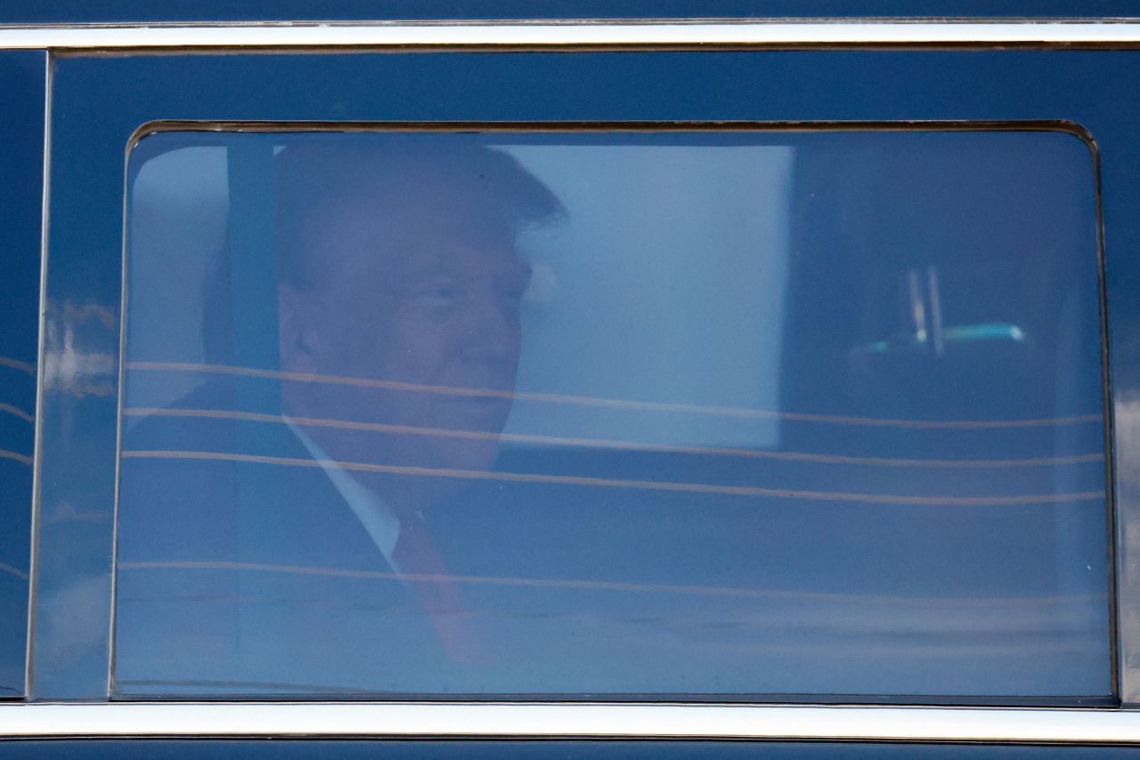 Former President Donald Trump arrives at the courthouse as he is expected to bid for dismissal in a hearing on a classified documents case, in Fort Pierce, Florida, on March 14. 