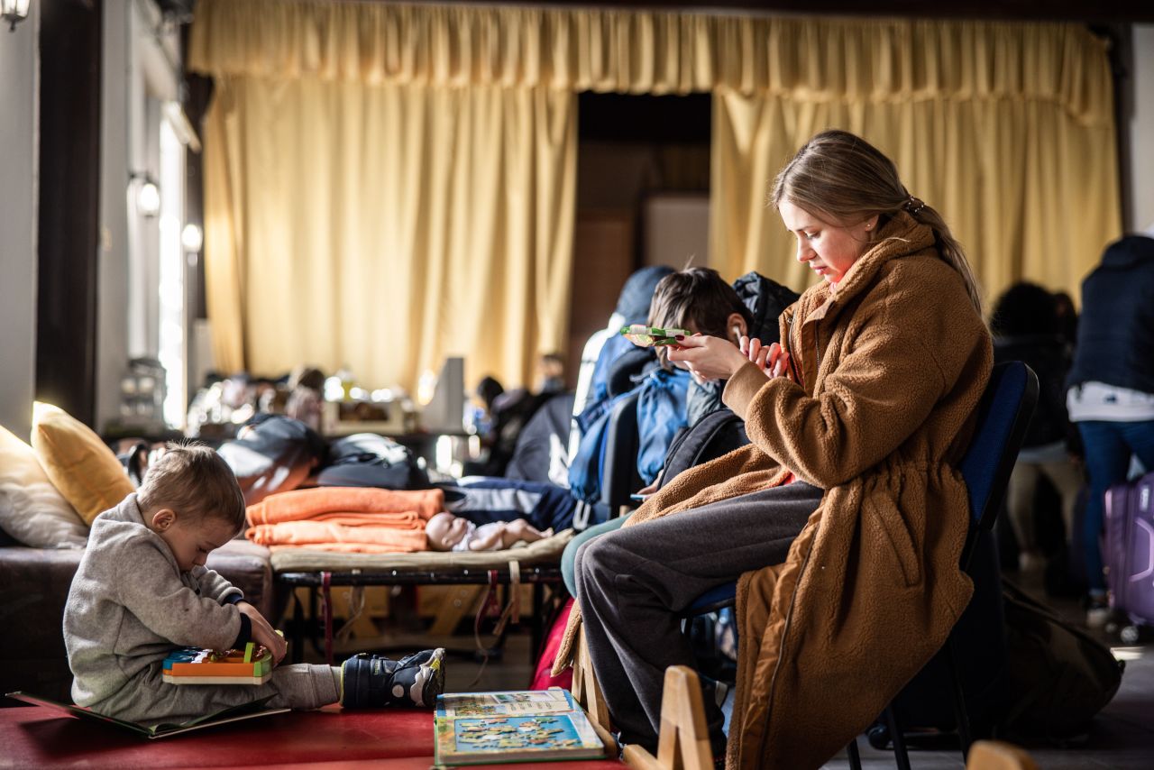 A displaced Ukrainian with her children at a temporary shelter in Beregsurany, Hungary, on Monday, Feb. 28.