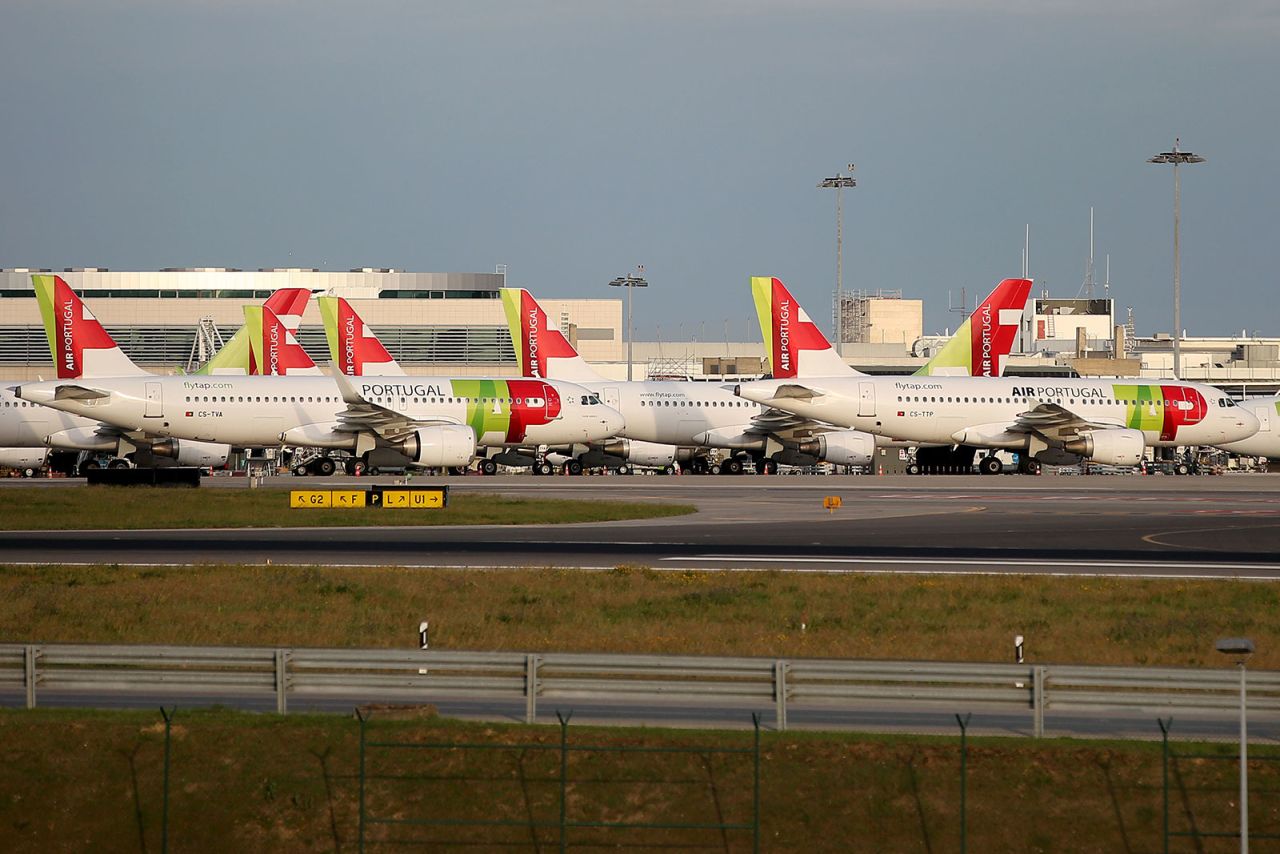 TAP Air Portugal planes are parked at Humberto Delgado Airport in Lisbon on March 24.