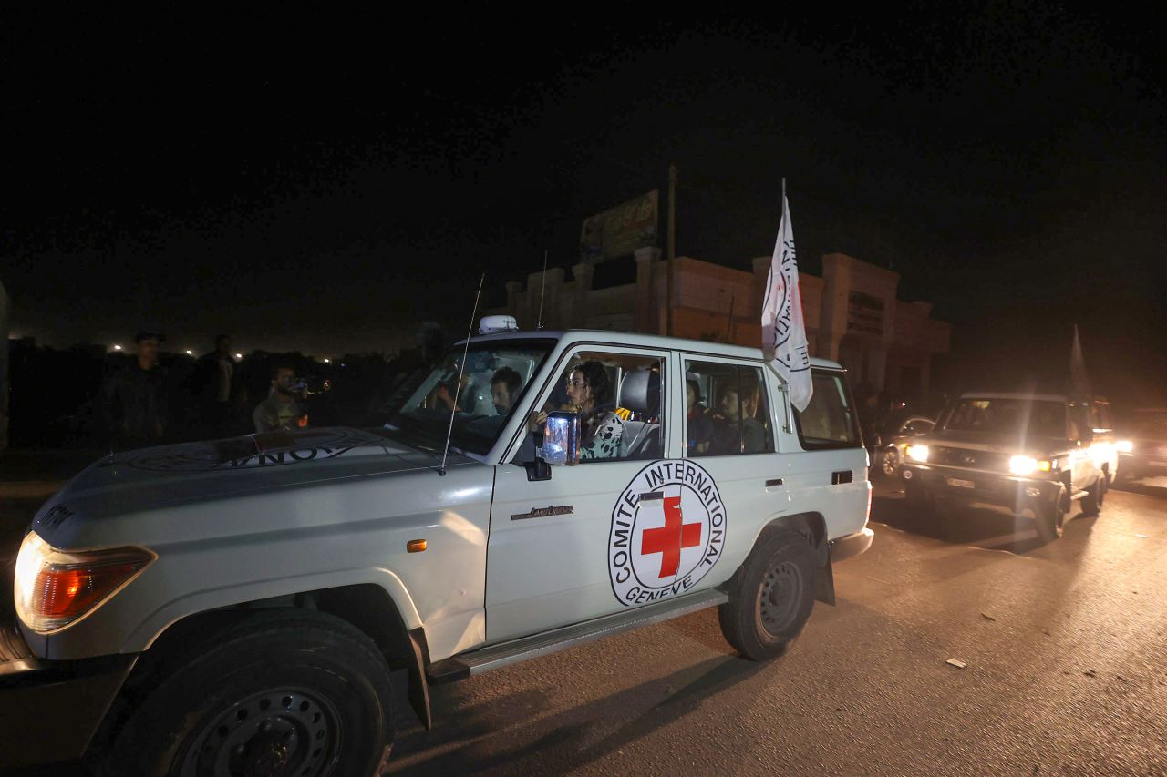 International Red Cross vehicles transport freed hostages to the Rafah border crossing in Gaza, on November 24. 
