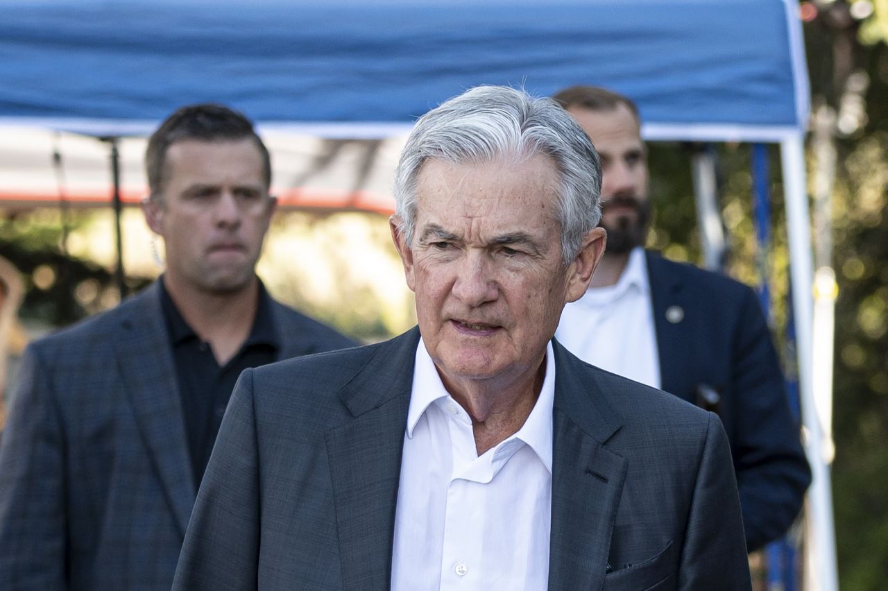 Jerome Powell walks the grounds at the Jackson Hole economic symposium.