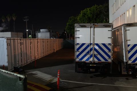 Refrigerated overflow morgue trailers and containers sit outside the Los Angeles County Department of Medical Examiner-Coroner in Los Angeles on January 6.