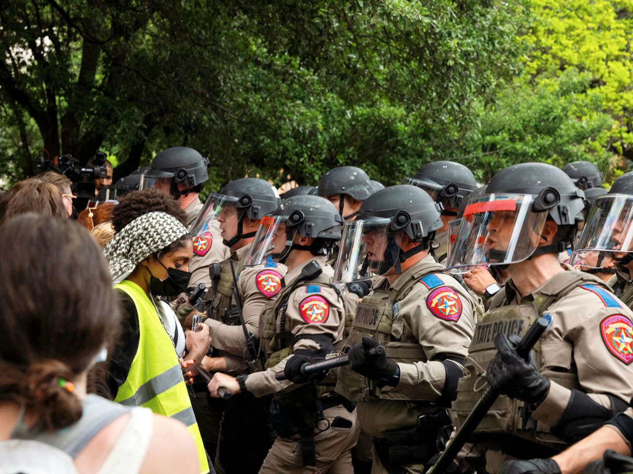 Pro-Palestinian demonstrators face off with Texas Department of Public Safety officers at the University of Texas at Austin on Wednesday, April 24. 