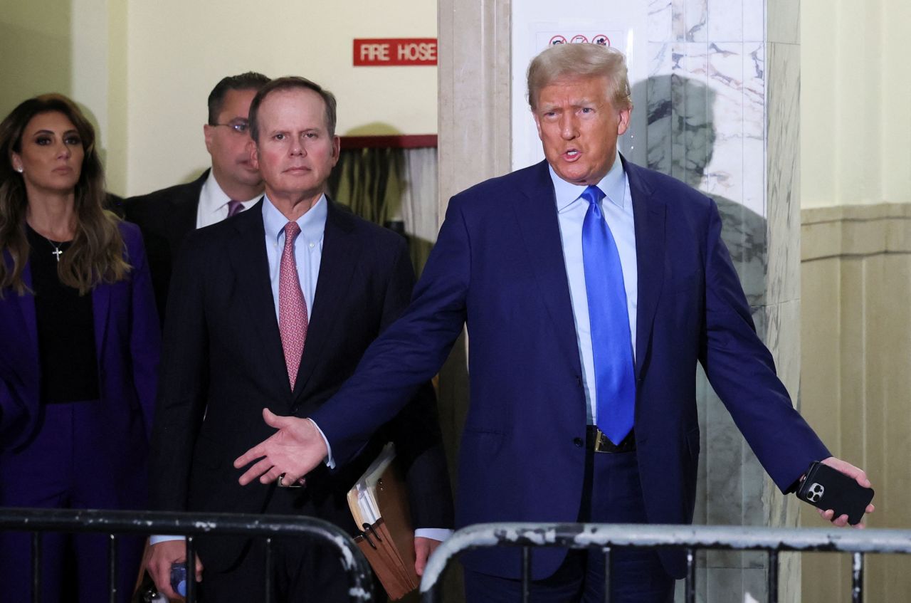 Former President Donald Trump speaks to the press after arriving at New York State Supreme Court on Tuesday.