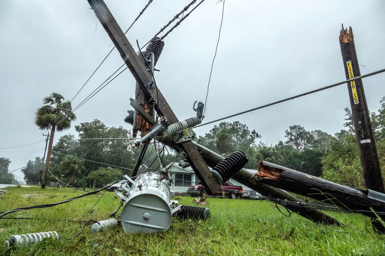 Downed power lines are seen in Jena, Florida, on Wednesday.