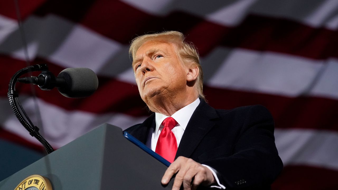 President Donald Trump speaks at a campaign rally at Des Moines International Airport on October 14 in Des Moines, Iowa. 