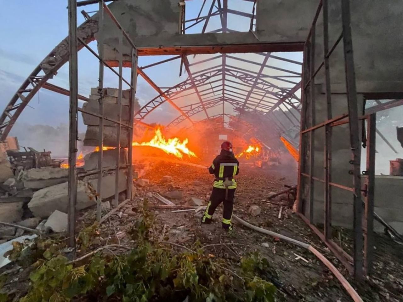 A firefighter works at a site that was hit amid Russian drone attacks in?Odesa?region, Ukraine, in this handout image released September 4.