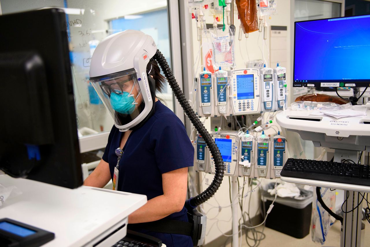 A nurse wearing personal protective equipment works in a Covid-19 intensive care unit at Martin Luther King Jr. Community Hospital on January 6, in the Willowbrook neighborhood of Los Angeles.