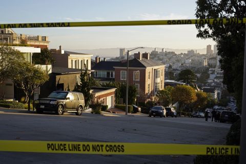 Police tape blocks a street outside the home of Speaker Nancy Pelosi and her husband Paul Pelosi in San Francisco on October 28.