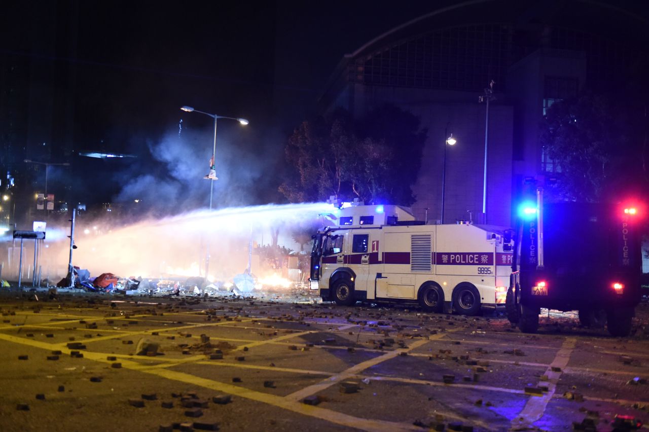 Police use a water cannon during clashes with protestors outside the Polytechnic University of Hong Kong on November 17, 2019.