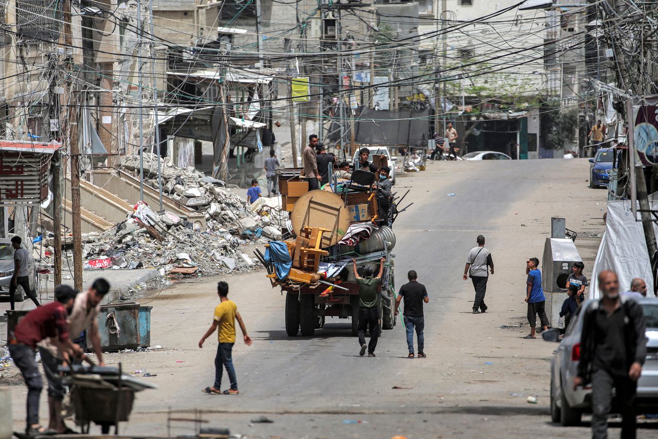 Palestinians leave Rafah, Gaza with their belongings on May 11. 