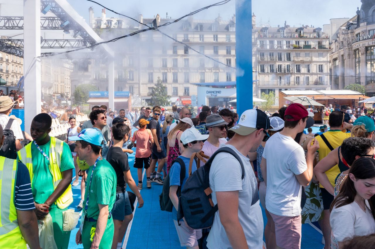  Spectators are cooled by misting fans at the Paris 2024 Olympic Games Hotel de Ville, in Paris, France, on July 30. 