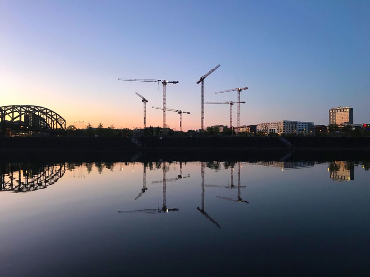 Cranes at a construction site for residential buildings in Frankfurt am Main, Germany, on April 29.