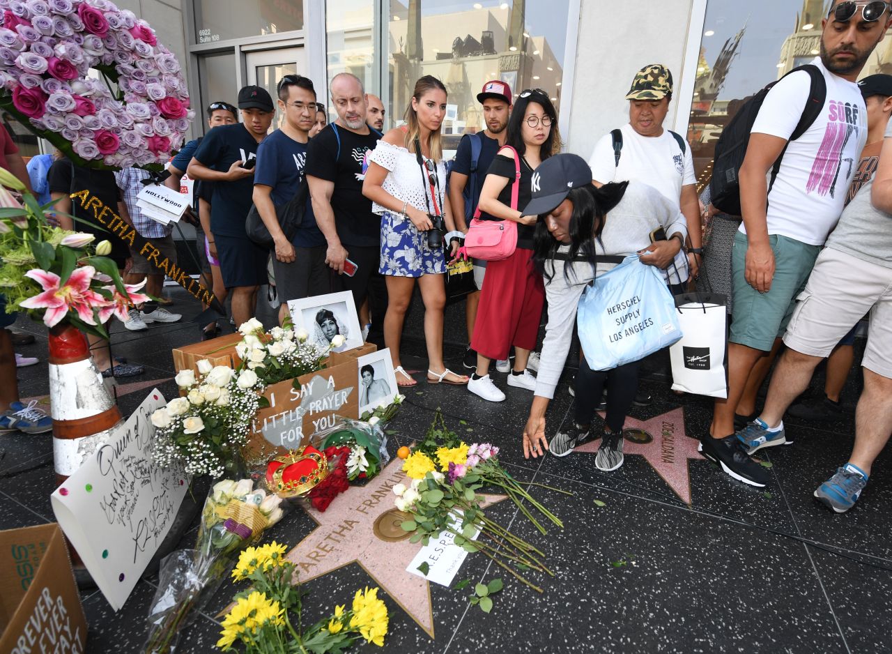 Fans place flowers on Aretha Franklin's star on the Hollywood Walk of Fame in Hollywood, California, on August 16, 2018. 