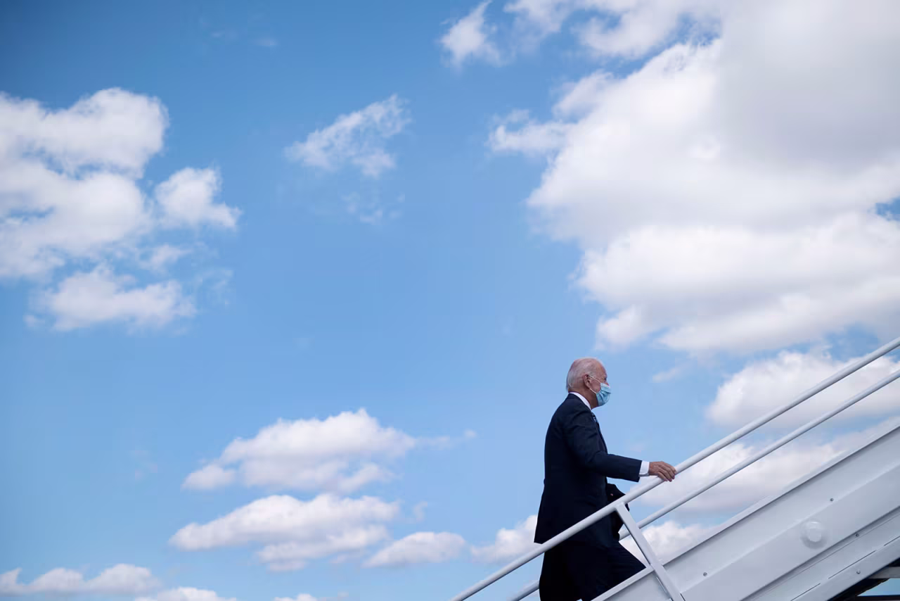 Democratic presidential candidate Joe Biden boards his campaign plane at Wilmington Airport on October 6, in New Castle, Delaware.