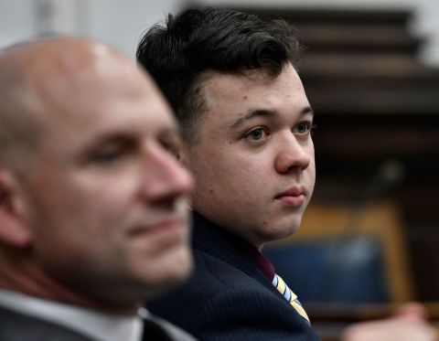 Kyle Rittenhouse, center, and his attorney Corey Chirafisi listen during his trial in Kenosha, Wisconsin, on November 11.