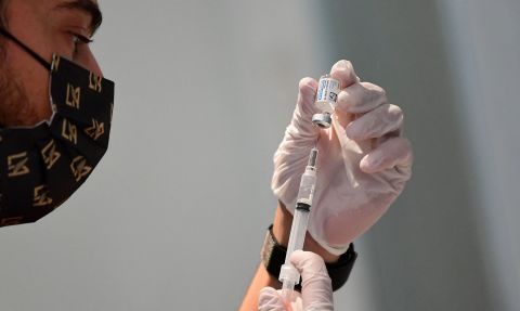 A health care worker prepares a Johnson & Johnson Covid19 vaccine on May 7, in Los Angeles.