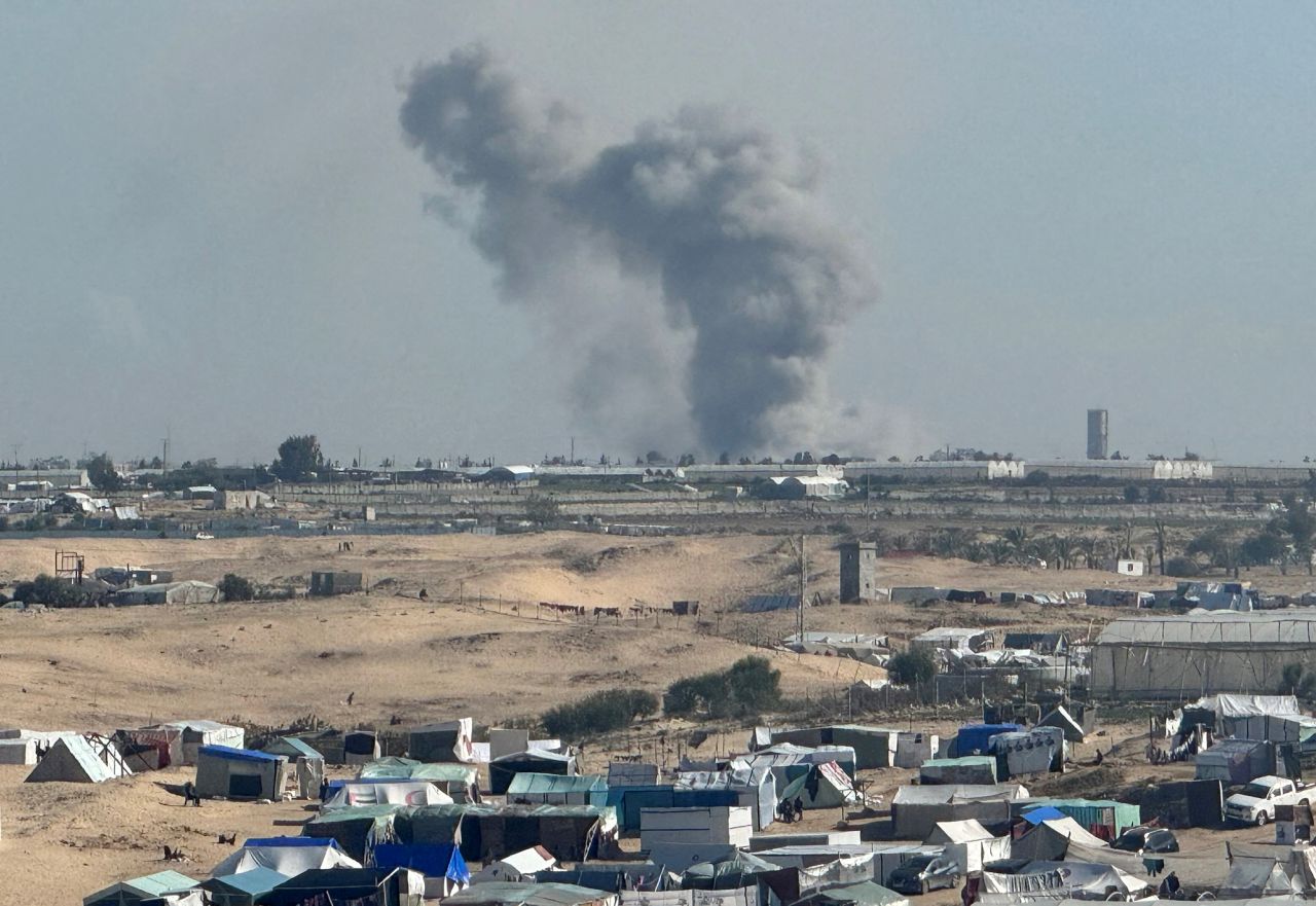 Smoke rises during an Israeli ground operation in Khan Younis as seen from a tent camp sheltering displaced Palestinians in Rafah, Gaza, on January 31.
