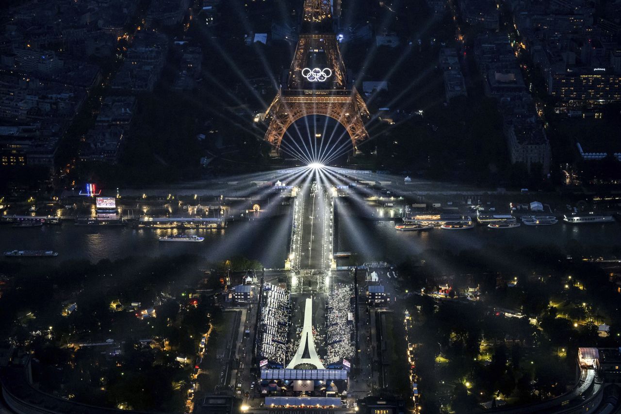 The Eiffel Tower and the Olympics rings are lit up during the ceremony.