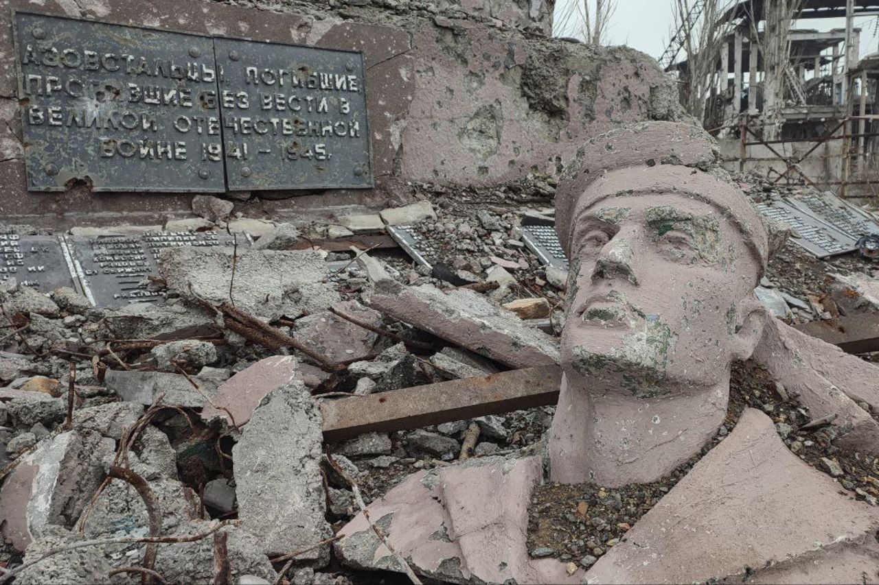 The remains of a statue and other rubble lie in front of the Azovstal steel mill in Mariupol, Ukraine, in December.