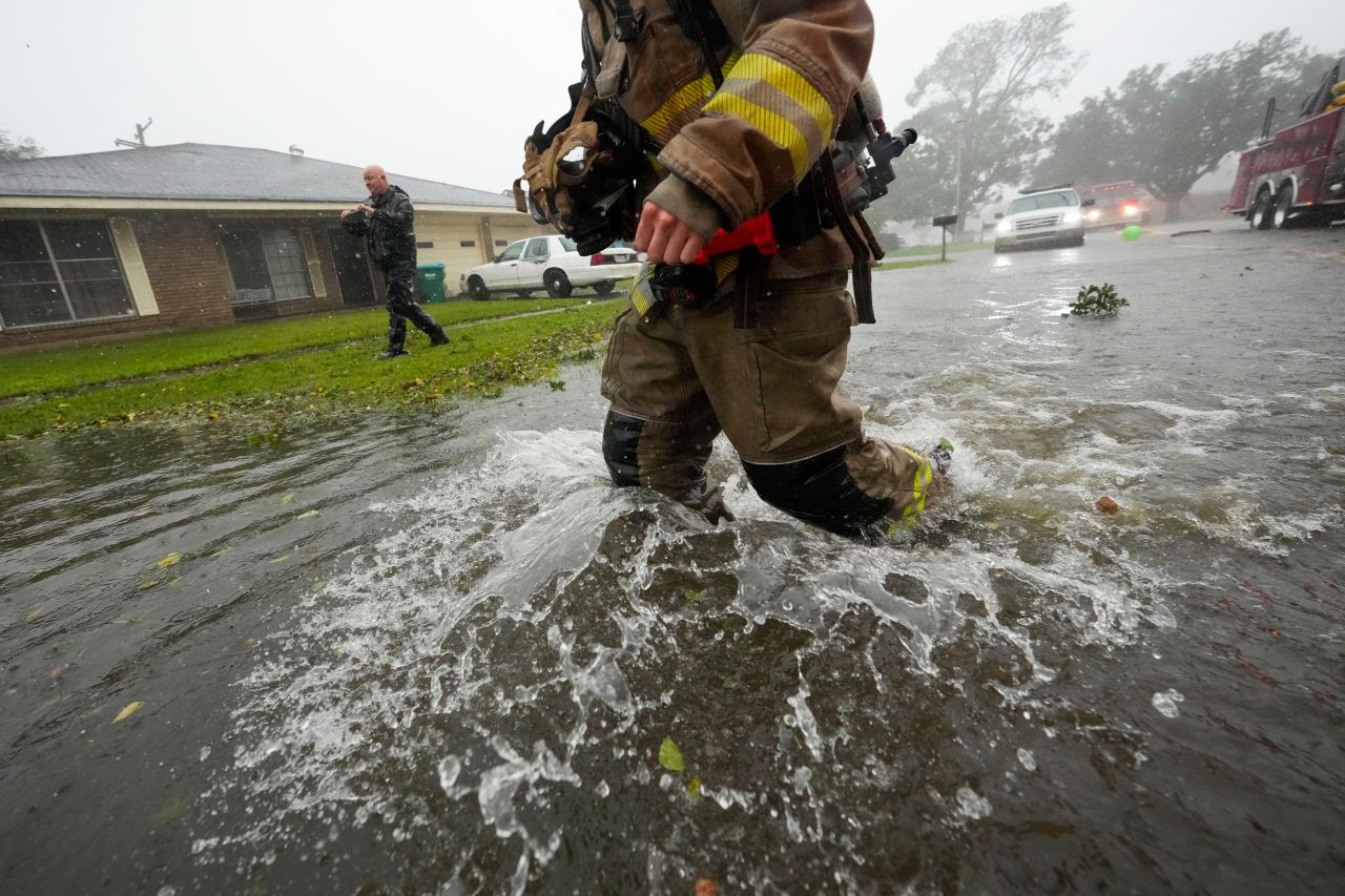 Morgan City firefighters respond to a home fire during Hurricane Francine in Morgan City, Louisiana, on September 11.