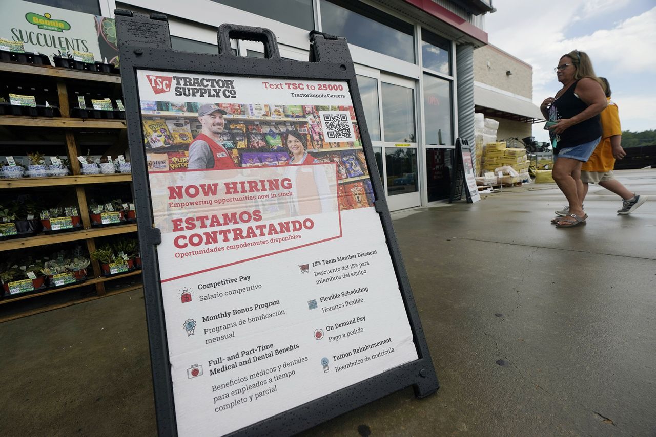 A "Now Hiring" sign is seen at a retailer looking for job applicants in Richland, Miss., on Sept. 6.