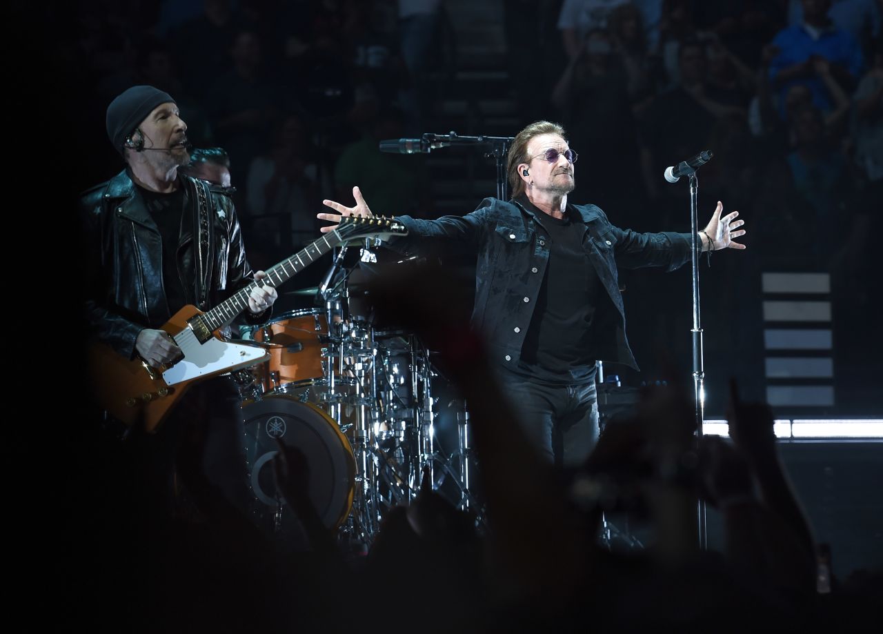 In this file photo, the Edge and Bono of the rock band U2 perform at Bridgestone Arena on May 26, 2018 in Nashville, Tennessee. 