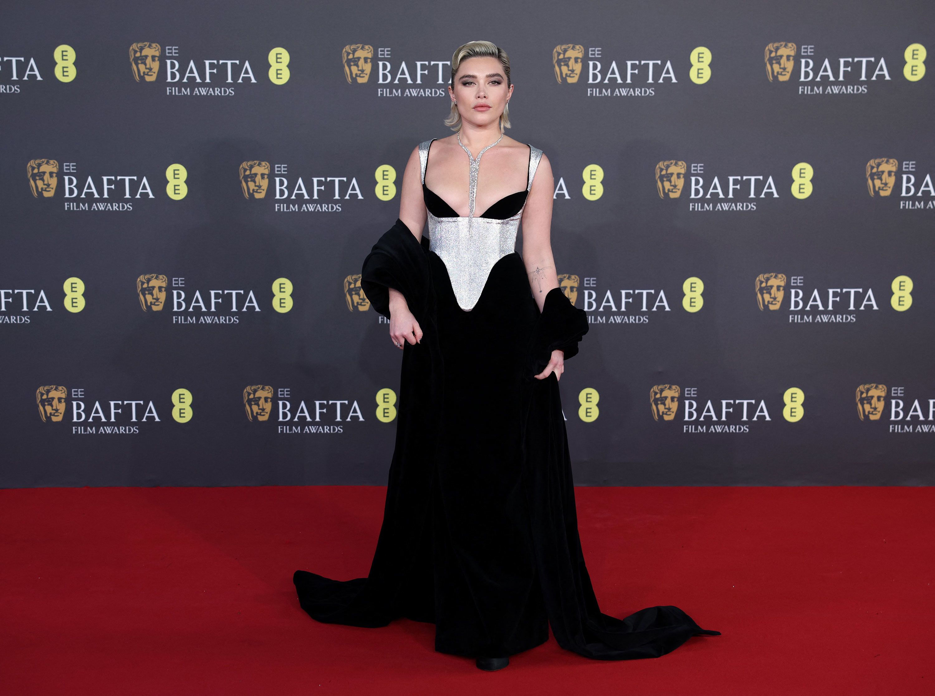 Florence Pugh opted for a Harris Reed dress paired with Boucheron jewelry