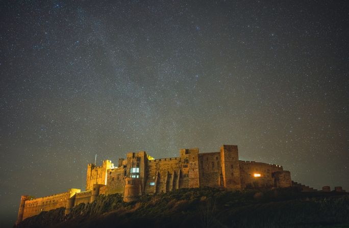 Night sky over Bamburgh Castle, near Northumberland National Park, UK, a Dark Sky reserve. Just south of Hadrian’s Wall, the Park is one of the darkest locations in England, according to Dark Sky International.