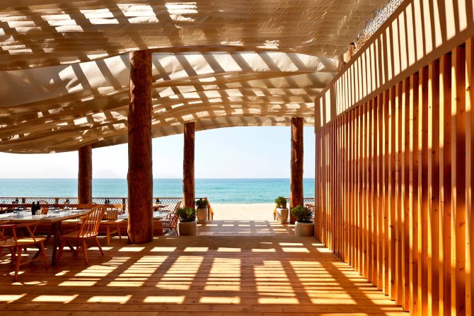 <strong>Beachfront dining: </strong>Barbouni at The Romanos offers airy outdoor dining.