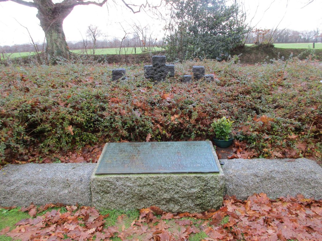 The mass grave in the German military cemetery at Normandy where Nathan Baskind was buried under three crosses.