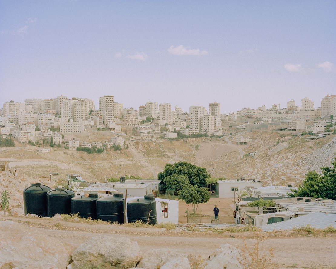 In the foreground, the Bedouin community of Jabar Al-Bab; behind it, the Israeli settlement of Ma'ale Adumim. 