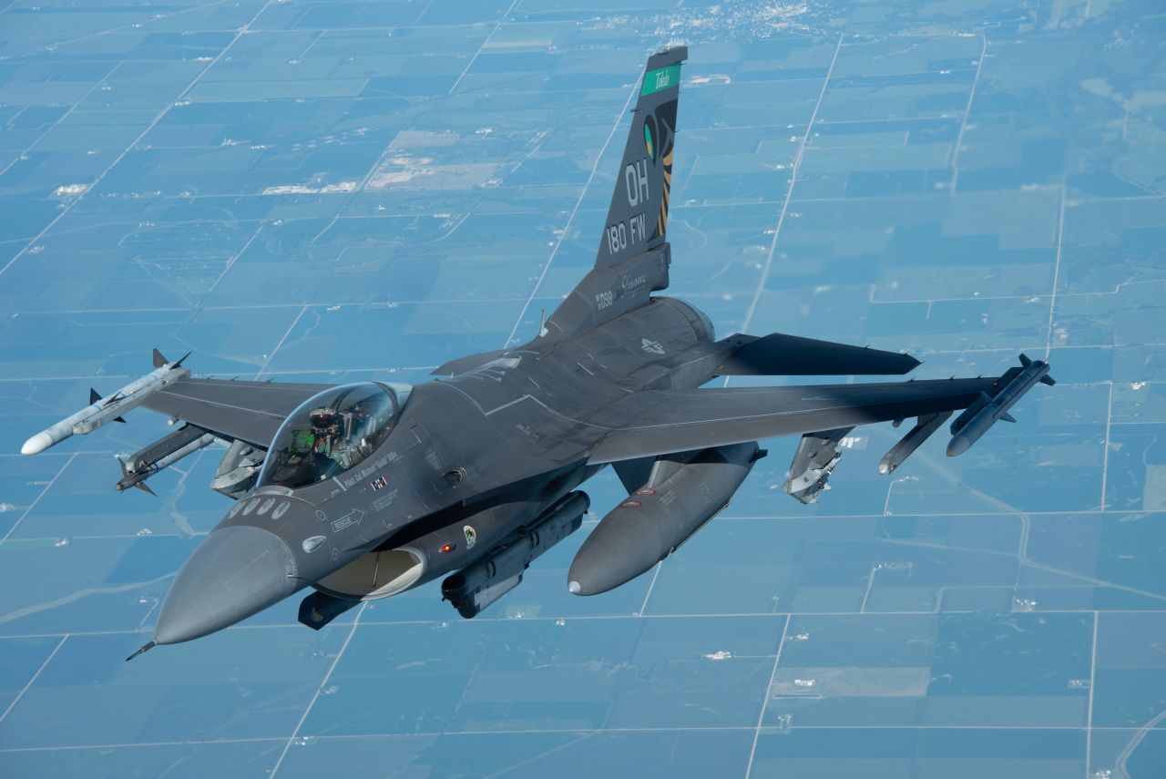 A US Air Force F-16 fighter jet flies over Iowa in August 2022. 