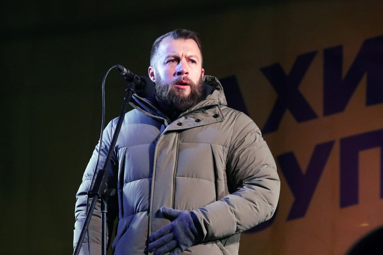 Maksym Zhorin speaks on stage during a rally in Kyiv, in December 2021.