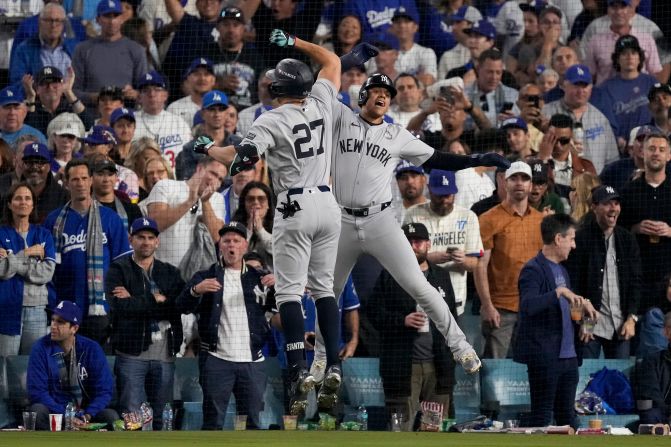 The New York Yankees' Giancarlo Stanton, left, celebrates his two-run home run with Juan Soto during the sixth inning. The homer put the Yankees up 2-1.