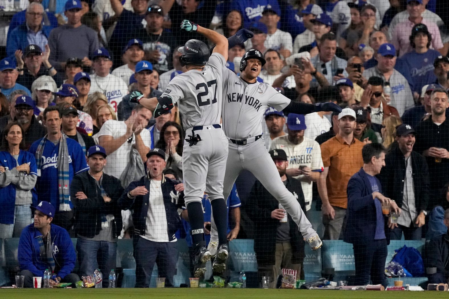 Stanton, left, and Solo celebrate Stanton's two-run homer that put the Yankees up 2-1 in the sixth inning of Game 1.