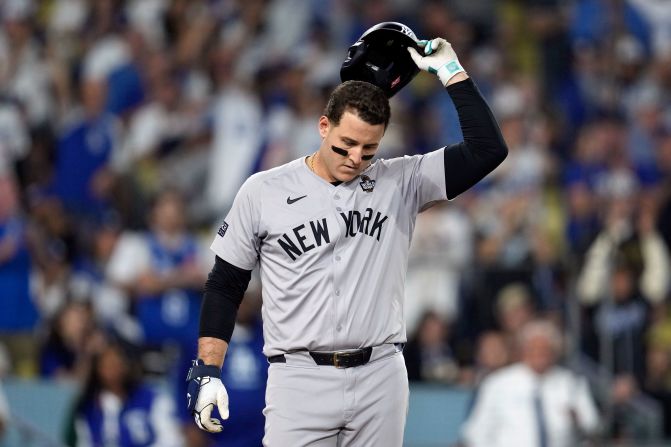 New York Yankees first baseman Anthony Rizzo tosses his helmet after striking out against the Los Angeles Dodgers in the fourth inning of Game 2.