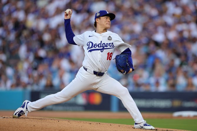 The Dodgers' Yoshinobu Yamamoto pitches in the first inning of Game 2.