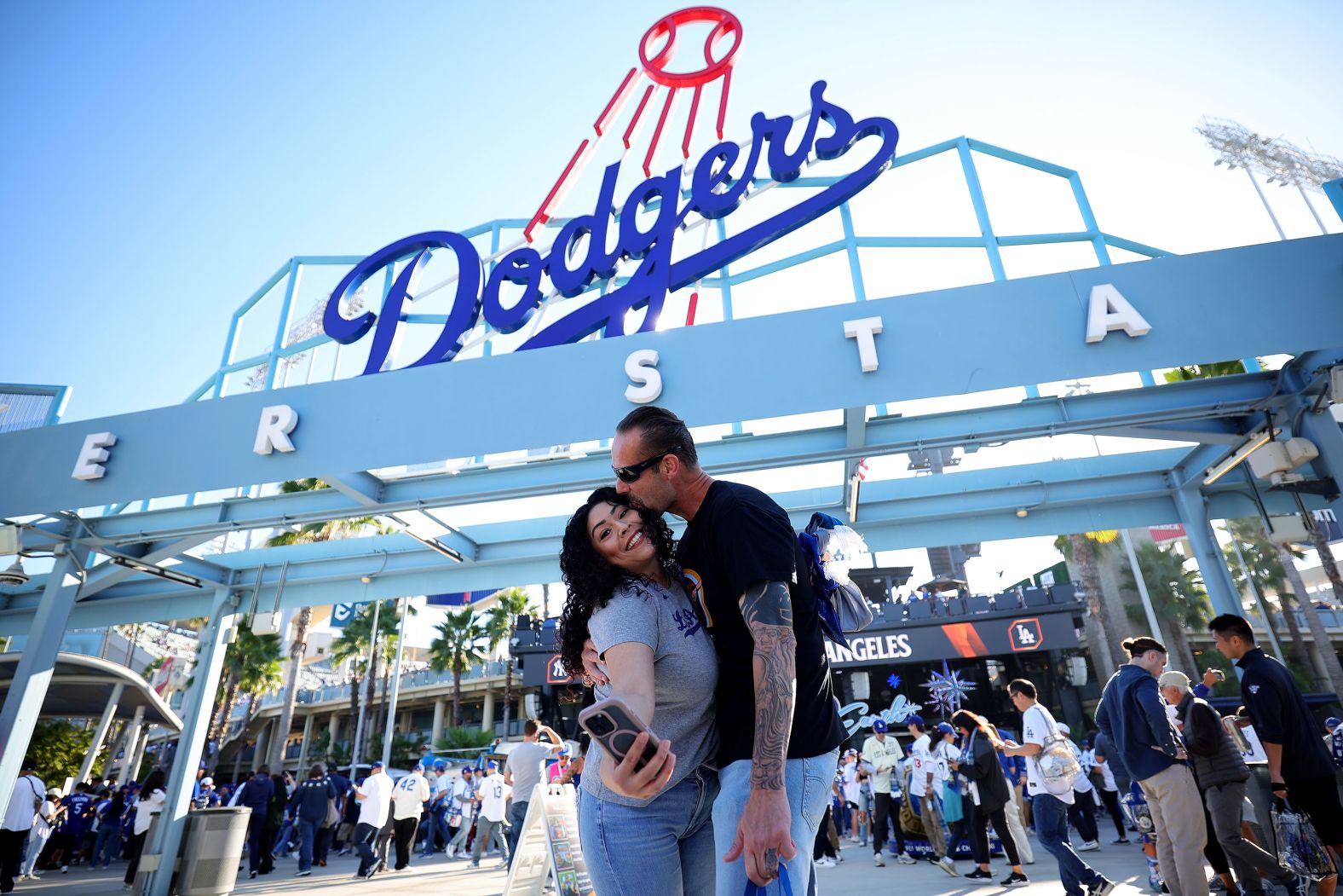 Fans take a photo inside Dodger Stadium ahead of Game 1.