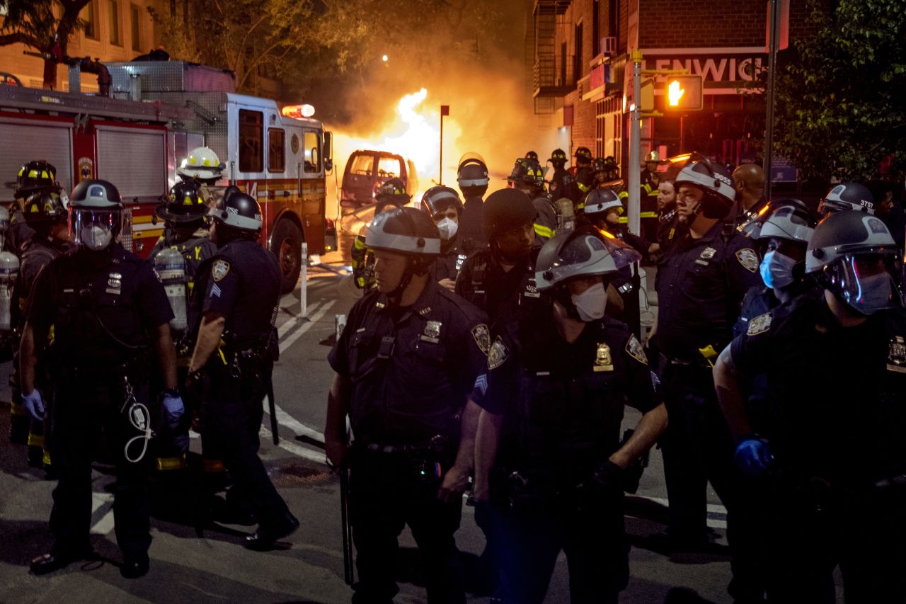 A vehicle burns near New York's Union Square on Saturday, May 30.