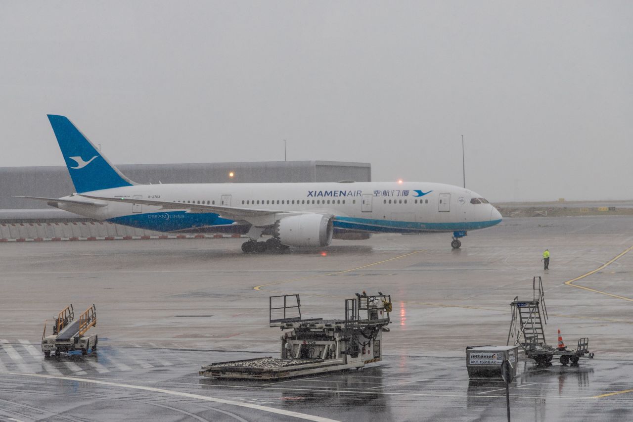 A passenger aircraft operated by Xiamen Airlines sits on the tarmac at Charles de Gaulle airport, in Roissy, France, on Tuesday, January 28.